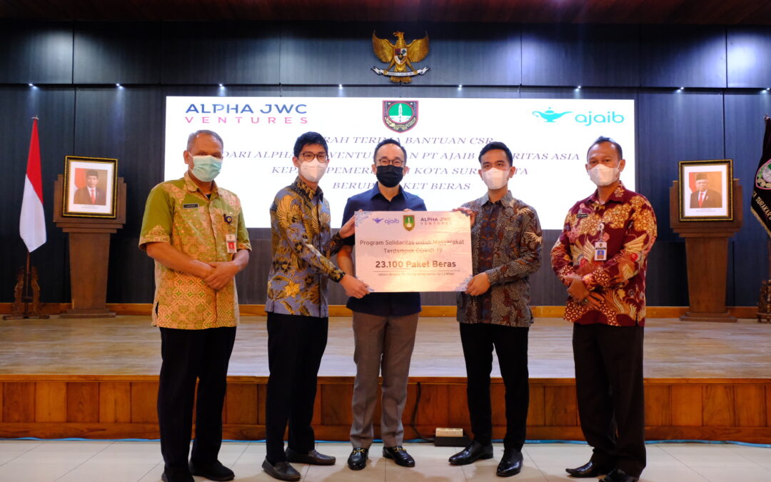 Alpha JWC Ventures dan Ajaib Bagikan Puluhan Ribu Paket Beras  Senilai 1,3 Miliar ke Warga Solo